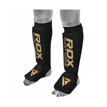 ESPINILLERA PARA MMA RDX LIGERA ACOLCHADA CON GELCERTIFICADA OEKO-TEX®           (NEGRA / DORADO)